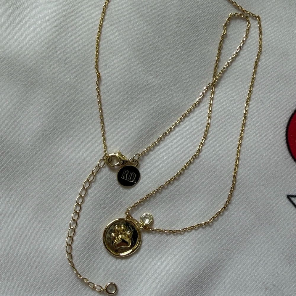 Gold Tone Paw Pendant Necklace
